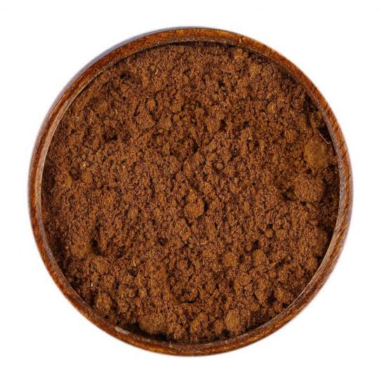 Galangal Powder - غرنجال finely milled spice in a wooden bowl, perfect for authentic Sudanese cooking.